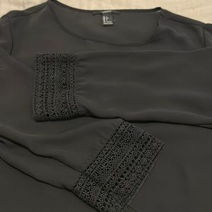 Black sheer-ish long sleeve blouse lace at sleeve cuff. Large